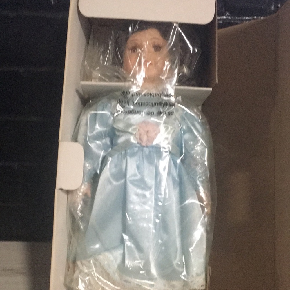 Heritage Collection Seasonal Spring porcelain doll with blue dress & white shoes